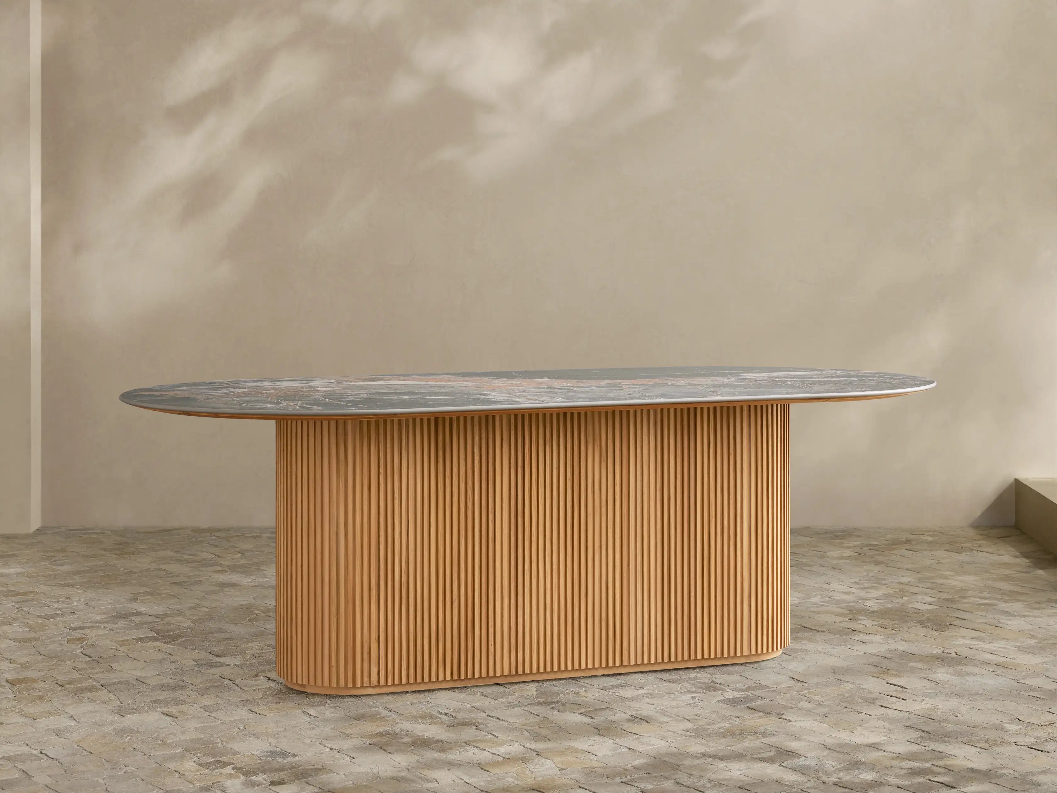 Beaumont Oval Stone Top Outdoor Teak Dining Table in Natural